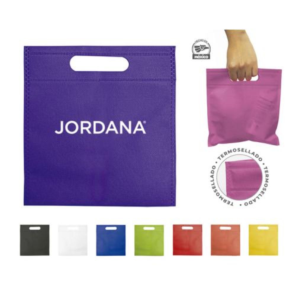 MINI BOLSA NON WOVEN SORPRESA  Mini bolsa ecológica termosellada, asa integrada, fabricada en su totalidad de material Non Woven. Peso máximo de carga de 2 kgs. imagen