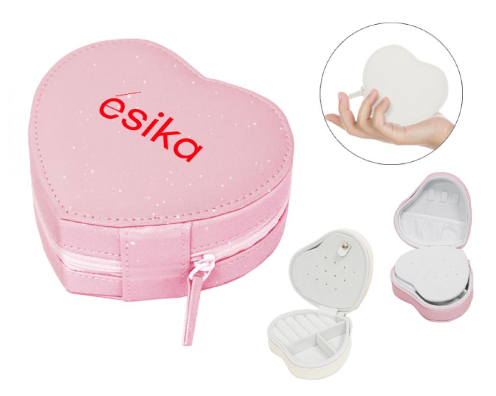 ESTUCHE P/ JOYAS AMORE  Alhajero portátil en forma de corazón con glitter y cierre. Suave interior tipo terciopelo para mayor protección, cuenta con 3 ganchos para colgar collares o pulseras, bolsa interna con elástico, panel central abatible para 6 juegos de aretes, 5 ranuras para anillos y 2 divisiones para diferentes accesorios. imagen