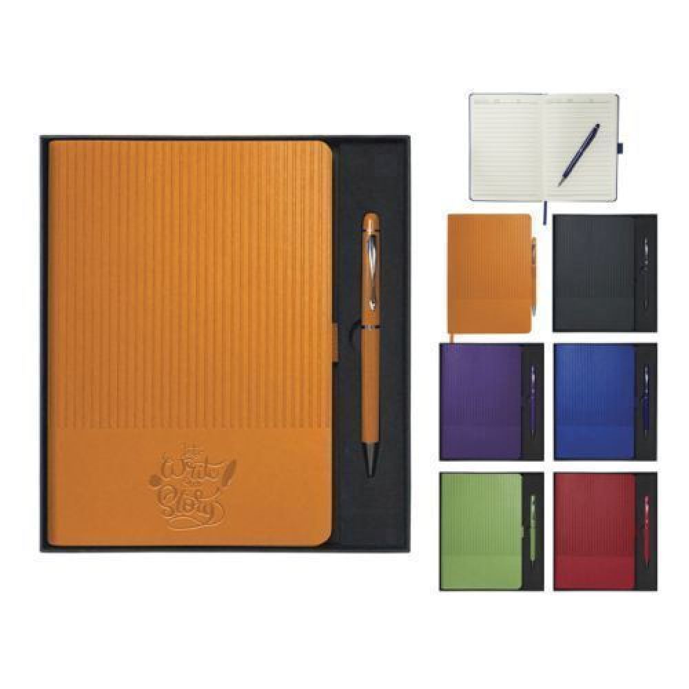 SET DE LIBRETA CON BOLIGRAFO NERUDA    Set de libreta con bolígrafo metálico. La libreta cuenta con pasta flexible, con textura de líneas verticales en la parte superior y área lisa en la parte inferior para poder personalizarse fácilmente. Es de 96 hojas rayadas (192 páginas), papel de 80 gr. color crema. Tiene listón separador en color de la pasta. Incluye bolígrafo de aluminio del color de la libreta con touch screen y detalles en cromo. Presentación: Caja de regalo en color negro. imagen