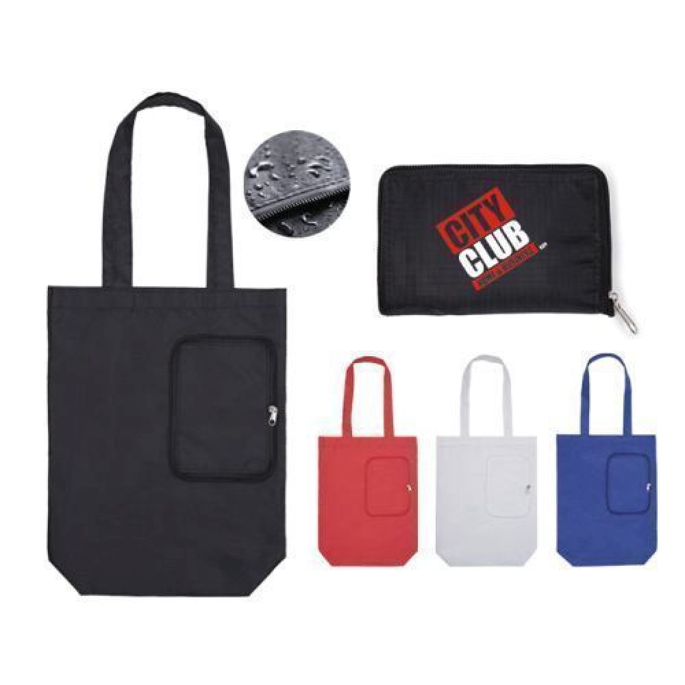 BOLSA MULTIFUNCIONAL PLEGABLE CON CIERRE SHARON   Bolsa multifuncional plegable con compartimento con cierre para guardarse, con fuelle en la base de 10 cm y cuenta con asas para transportar. Peso máximo de carga de 12 kgs. imagen