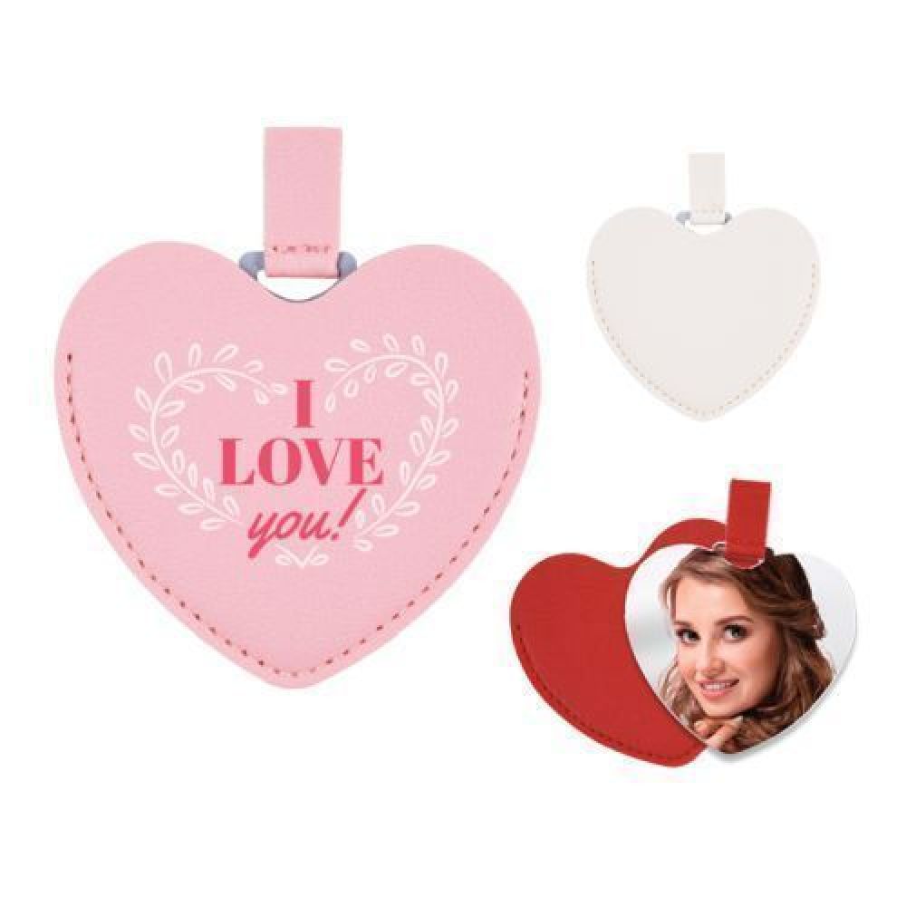 ESPEJO DE ACERO INOXIDABLE CON ESTUCHE EN FORMA DE CORAZÓN MINNIE   Espejo de acero inoxidable con cintillo y funda de poliuretano en forma de corazón. imagen