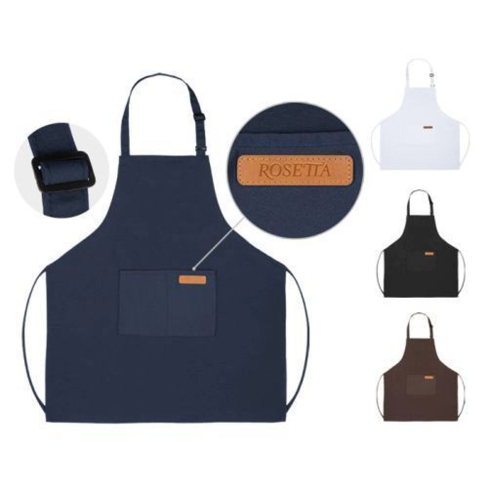 Mandil de poliéster con doble bolsillo frontal, cuenta con detalle de curpiel en la bolsa izquierda, cintillo al cuello ajustable por medio de una hebilla plástica y cordones para ajustarse a la cintura imagen