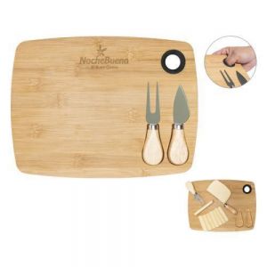 TABLA DE QUESOS CON ARILLO CHEDDAR    Tabla para quesos y carnes frías de bambú que incluye: 1 cuchillo y 1 tenedor de acero inoxidable con mango de madera. La tabla cuenta con 2 imanes y 2 compartimentos para colocar los utensilios y un arillo de silicón para sostener la tabla o colgar. Presentación: caja en color blanco.