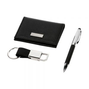 Set de regalo fabricado en curpiel y metal, incluye llavero, bolígrafo con puntero touch y cartera porta tarjetas. Bolígrafo tinta negra.